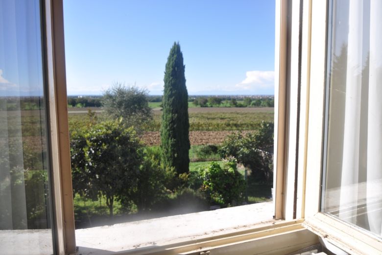 Early twentieth-century villa surrounded by greenery in Codevilla-Oltrepò Pavese 